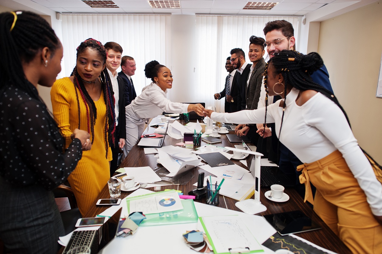 Multiracial young creative people in modern office